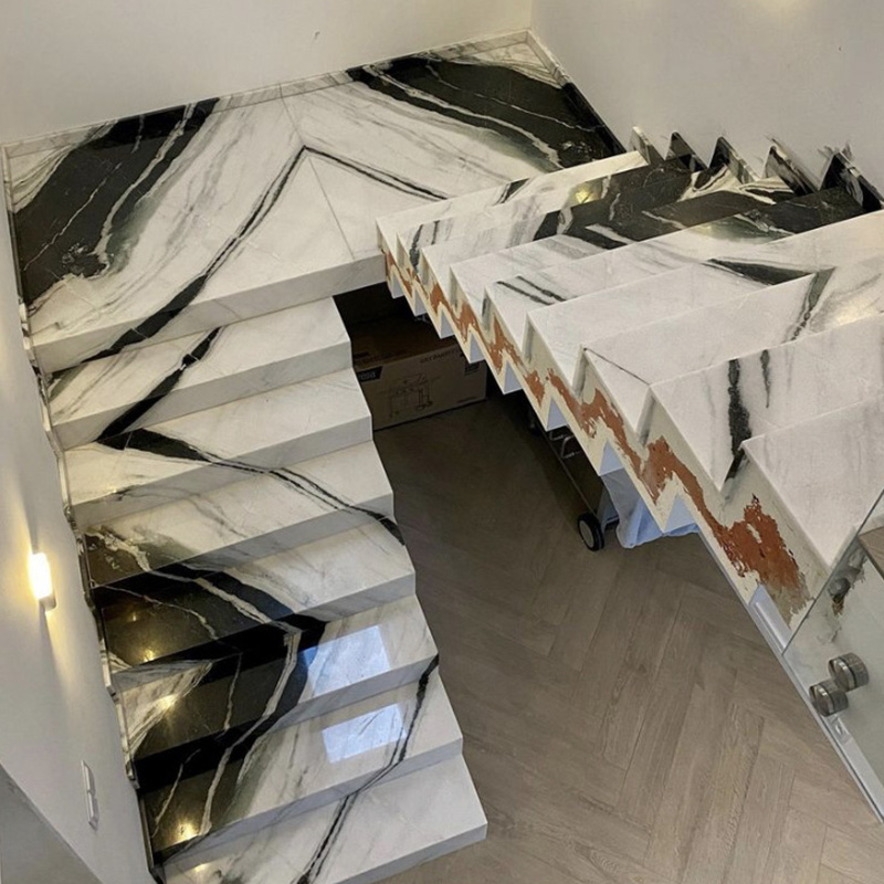Les marches d'escalier en marbre noir et blanc modernes personnalisent la vente en gros