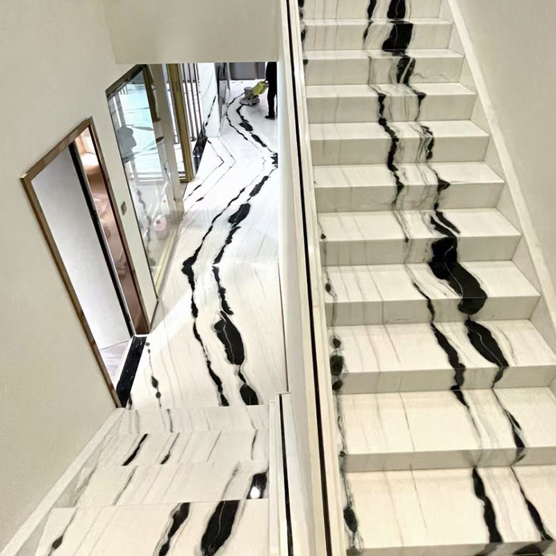 Les marches d'escalier en marbre noir et blanc modernes personnalisent la vente en gros