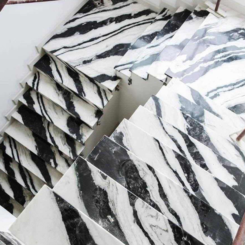 Les marches d'escalier en marbre noir et blanc modernes personnalisent la vente en gros