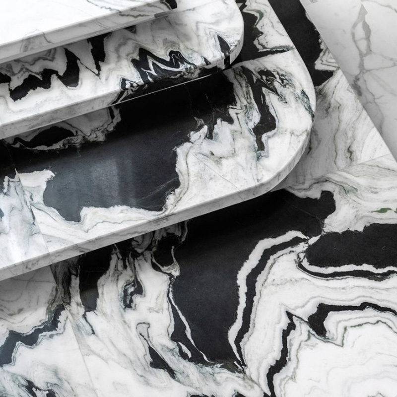 Les marches d'escalier en marbre noir et blanc modernes personnalisent la vente en gros